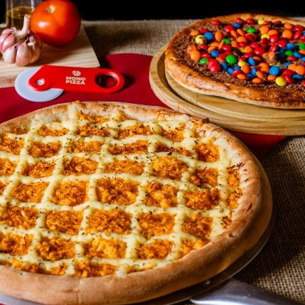 1 Pizza Salgada Grande e por + R$29,90 uma Pizza Doce