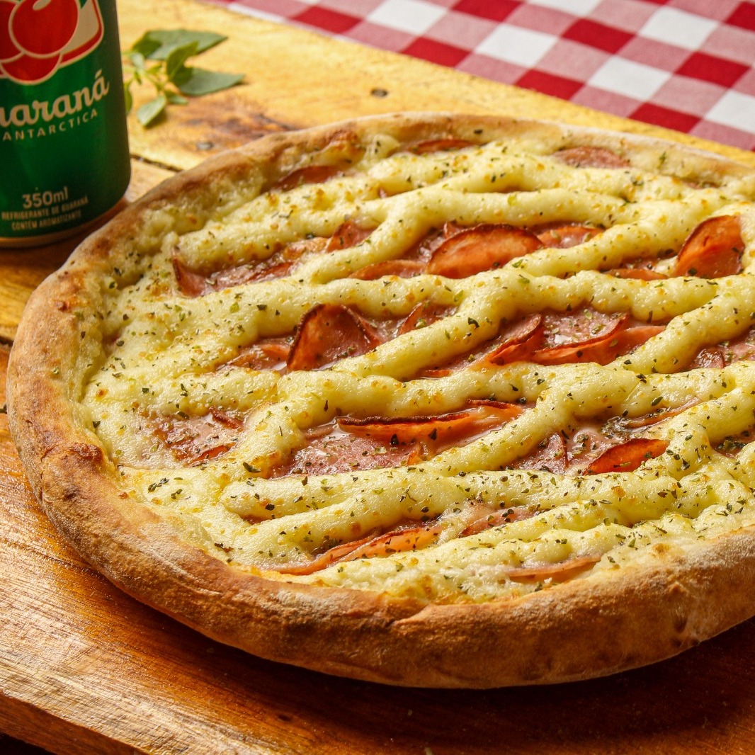 1 Pizza Salgada de 25cm +1 Pizza doce de 25cm + 1 Refri Lata 350ml (Grátis)