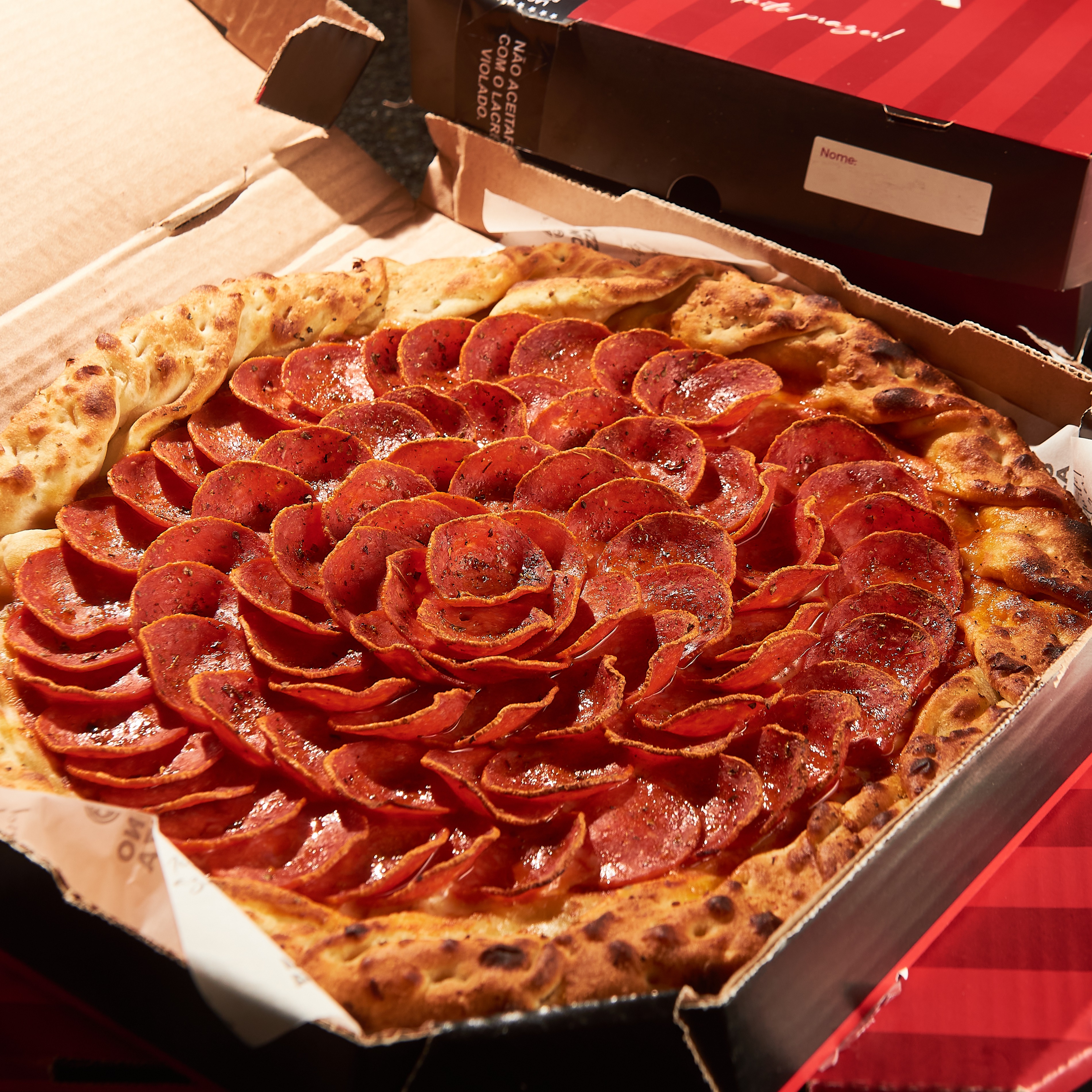 1 Pizza Salgada Gigante e por + R$19,90 uma Pizza Doce