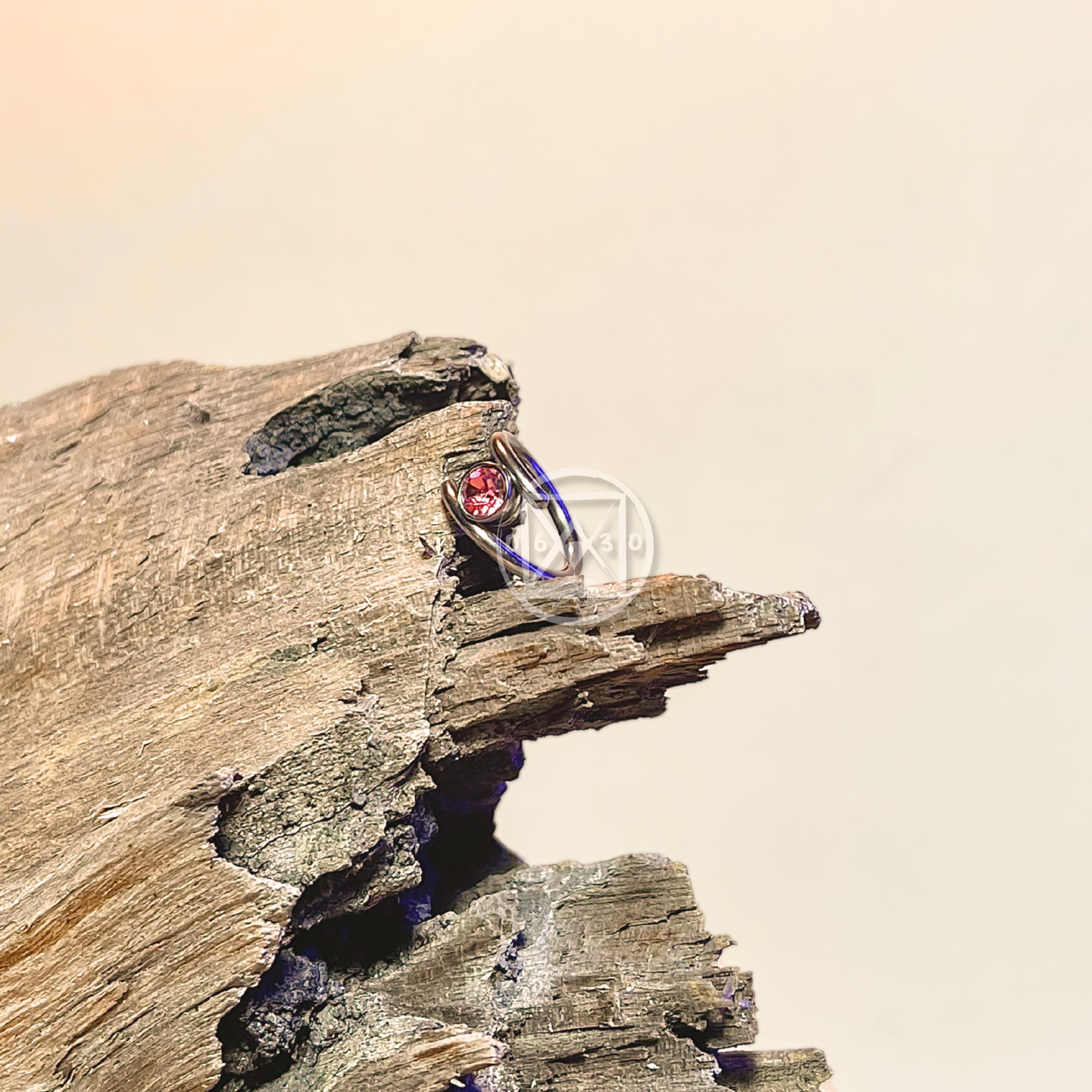 JÓIA AÇO ARGOLA SEGUIMENTO PEDRA ROSA - 1.2X10 UNID