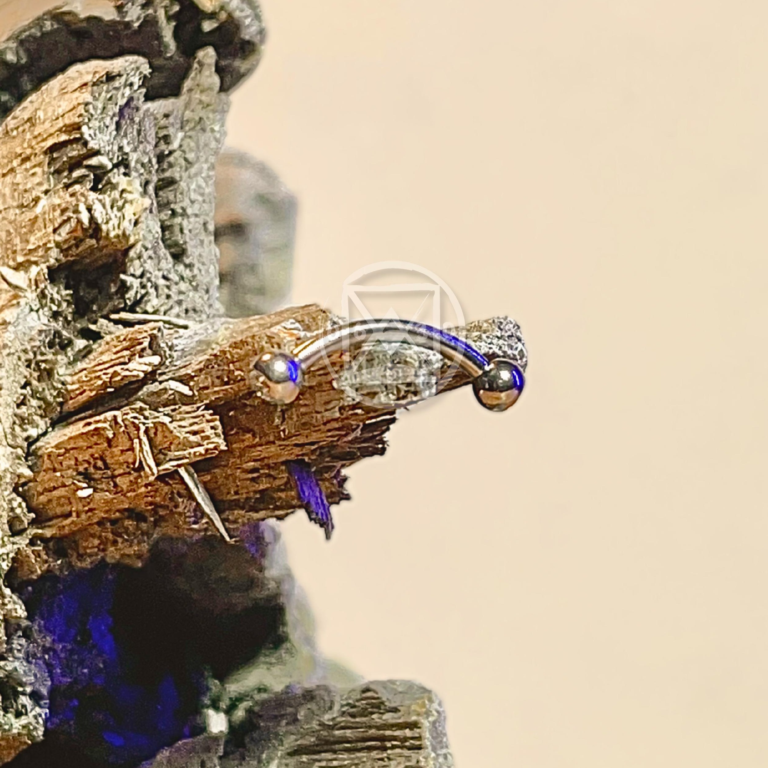 JÓIA AÇO BARBELL CURVO PEDRA BRANC. - 1.2X10X3 UNID