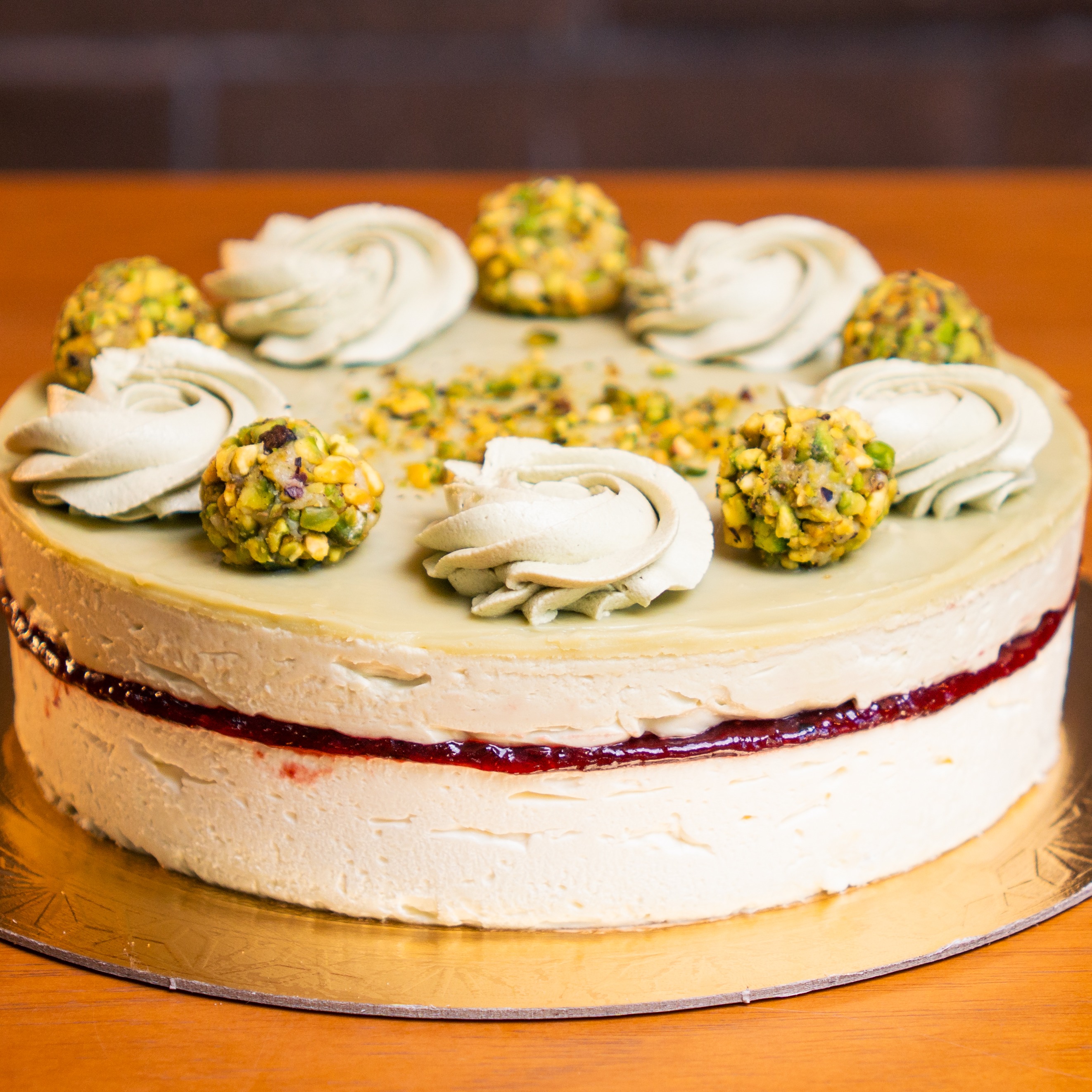 Torta Cheescake de Pistache com Geleia de Frutas Vermelhas