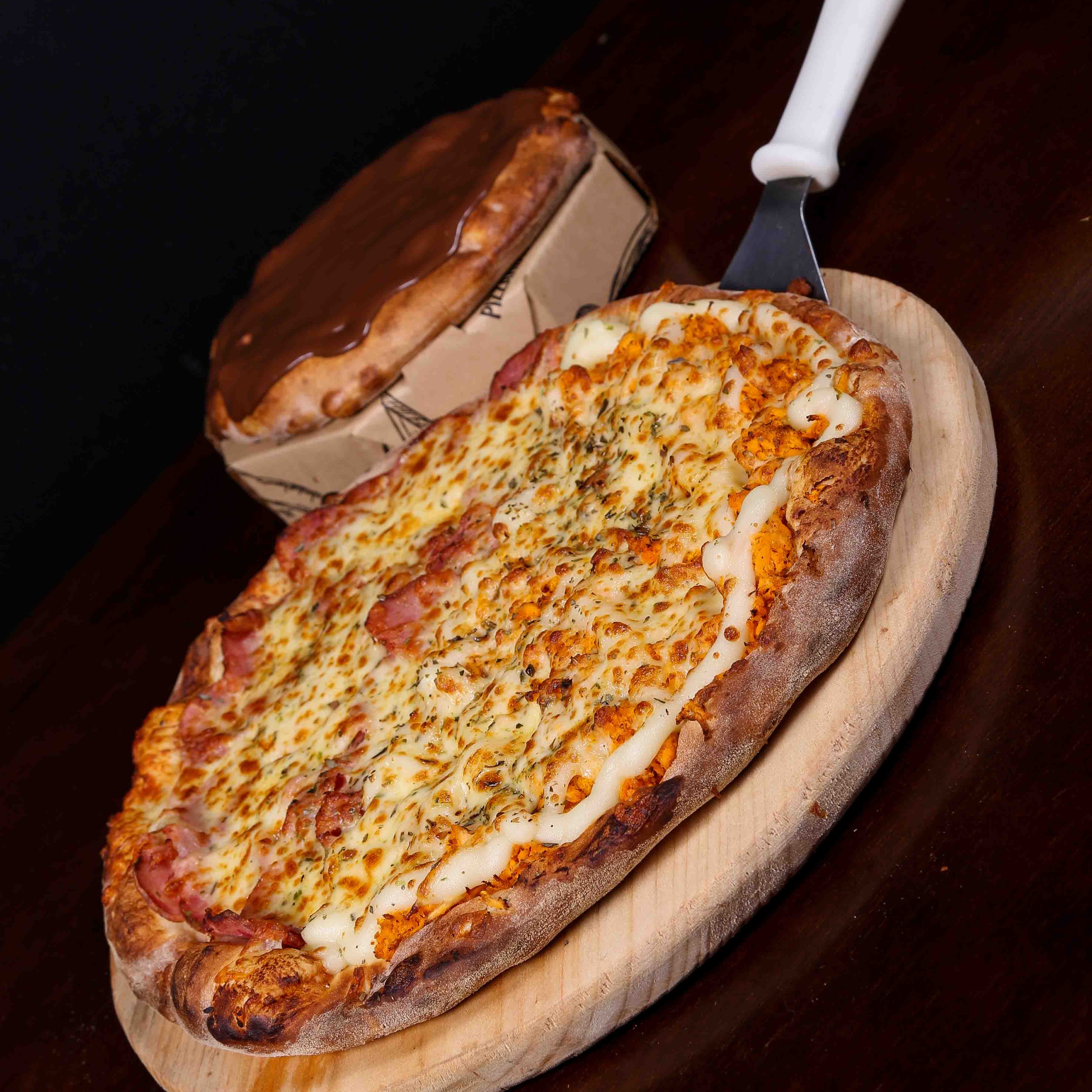 Compre uma Pizza Grande e Ganhe "Mini Pizza" Chocolate