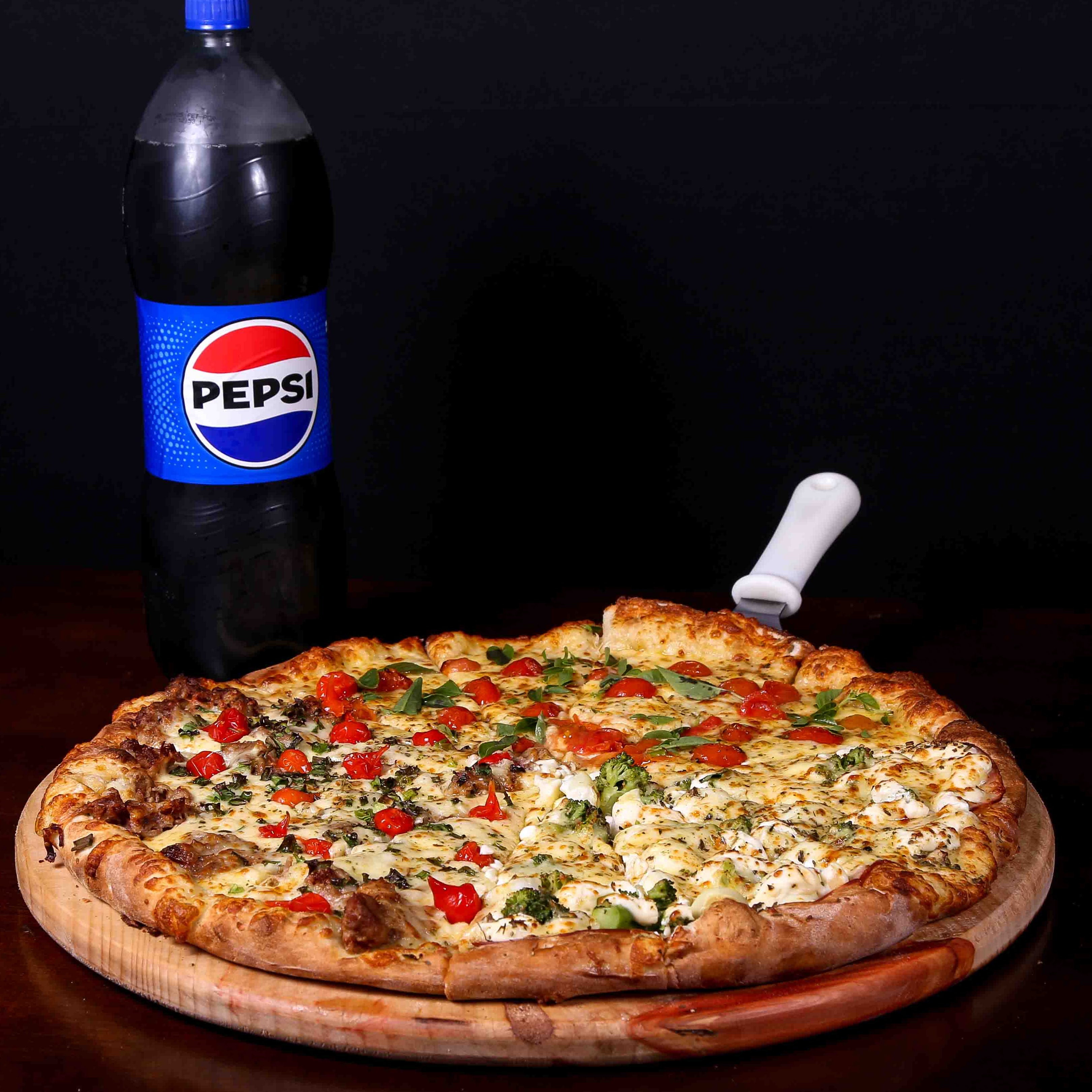 Compre uma Pizza Big e Ganhe uma Pepsi 2l