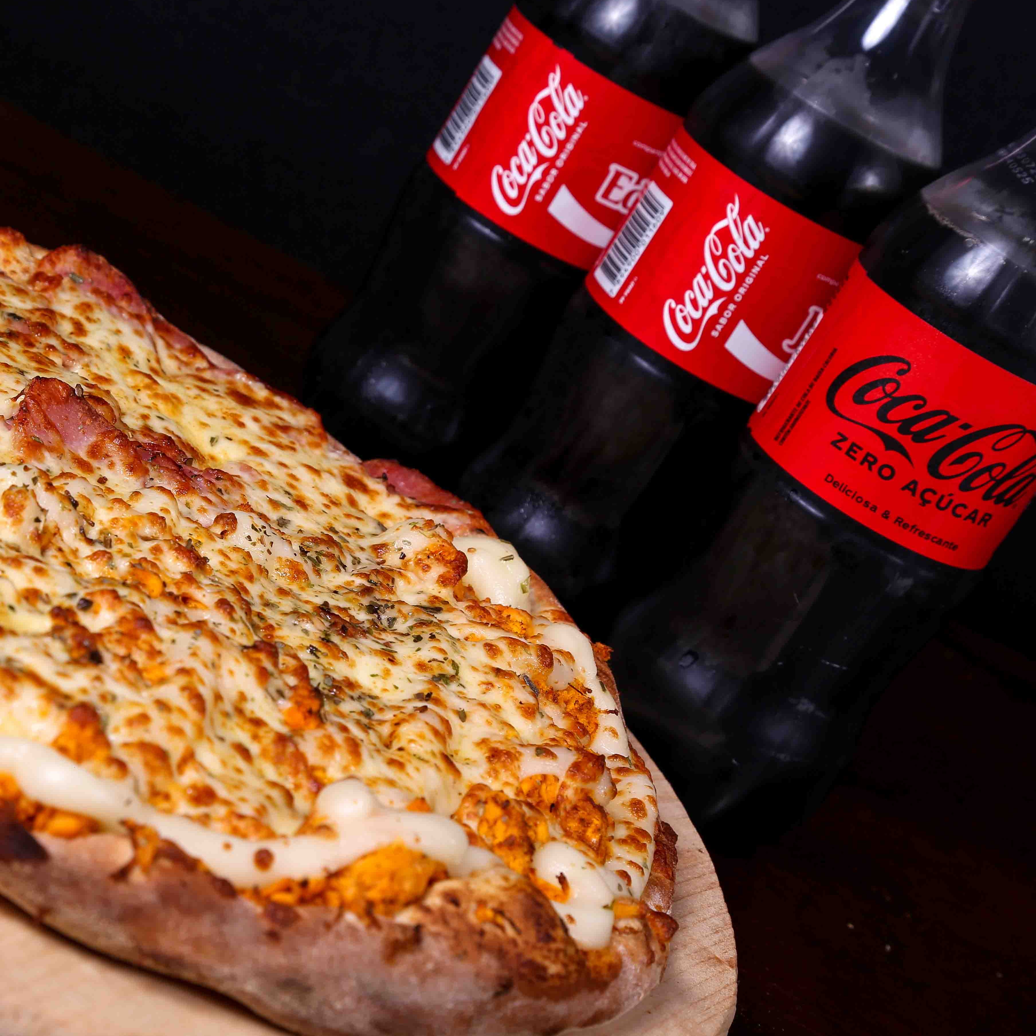 Compre uma Pizza Grande e Ganhe Coca-Cola1 litro
