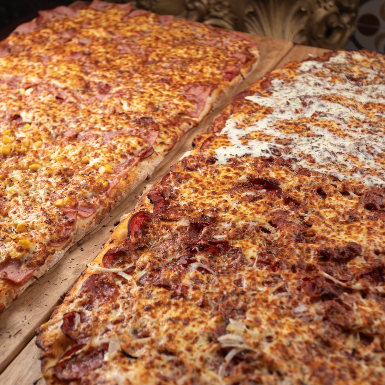Pizza Tabuleiro em Dobro (50% OFF na segunda)