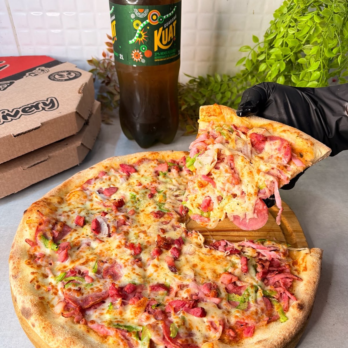 1 Pizza gigante à Moda + Kuat 2l