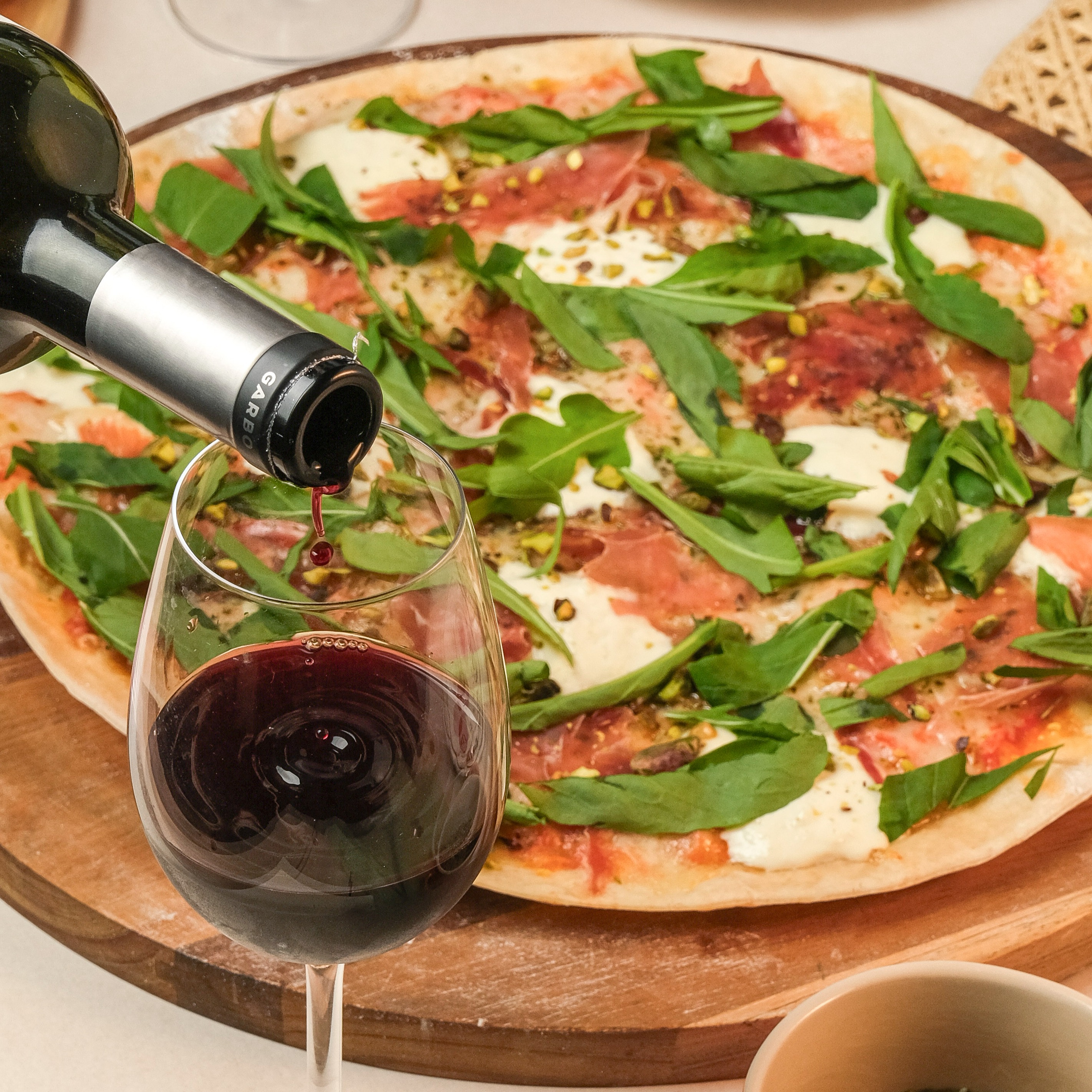10% de desconto no Vinho na compra de 1 Pizza G