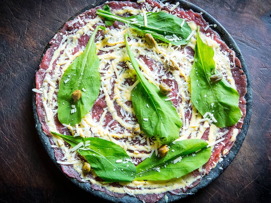 Carpaccio de Wagyu c/ salada de rúcula